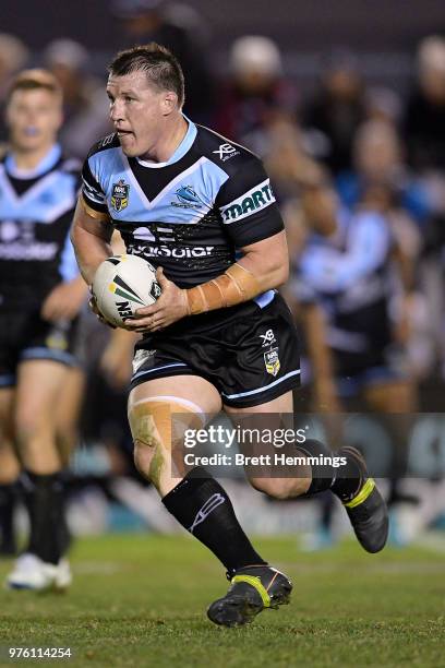 Paul Gallen of the Sharks runs the ball during the round 15 NRL match between the Cronulla Sharks and the Brisbane Broncos at Southern Cross Group...