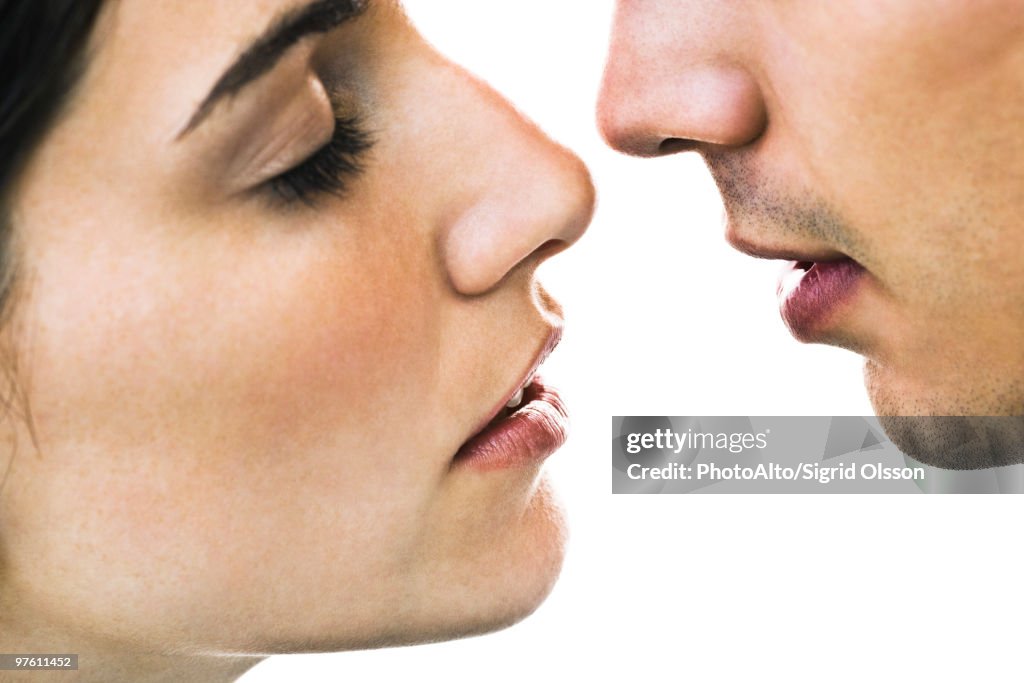 Couple about to kiss, close-up