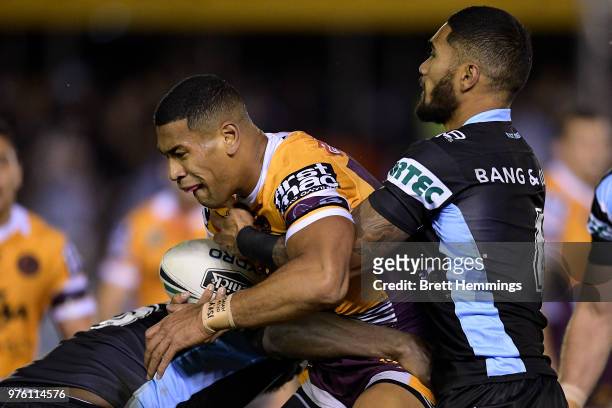 Jamayne Isaako of the Broncos is tackled during the round 15 NRL match between the Cronulla Sharks and the Brisbane Broncos at Southern Cross Group...