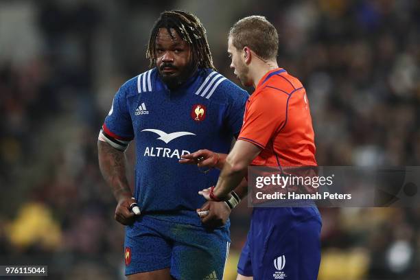 Referee Angus Gardner of Australia talks to Mathieu Bastareaud of France during the International Test match between the New Zealand All Blacks and...