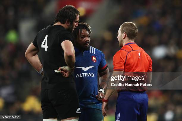 Referee Angus Gardner of Australia talks to Mathieu Bastareaud of France and Samuel Whitelock of the All Blacks during the International Test match...