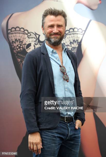French actor Alexandre Brasseur poses during a photocall for the TV show "Demain nous appartient" as part of the 58nd Monte-Carlo Television Festival...