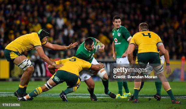 Melbourne , Australia - 16 June 2018; Niall Scannell of Ireland is tackled by Caleb Timu of Australia during the 2018 Mitsubishi Estate Ireland...