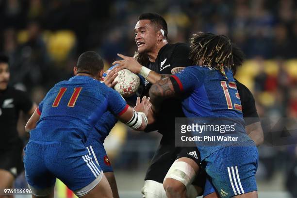 Vaea Fifita of the New Zealand All Blacks is tackled during the International Test match between the New Zealand All Blacks and France at Westpac...