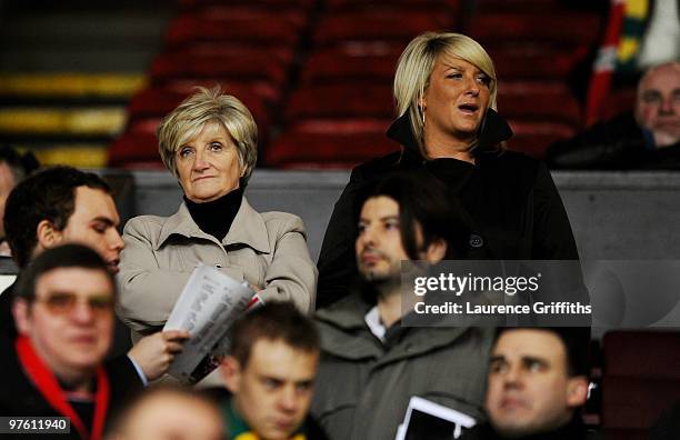 David Beckham's mother Sandra Beckham and sister Joanne Beckham look on from the stands during the UEFA Champions League First Knockout Round, second...