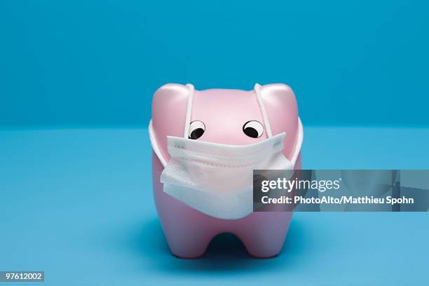 swine flu concept, toy pig wearing flu mask - funny surgical masks stock pictures, royalty-free photos & images