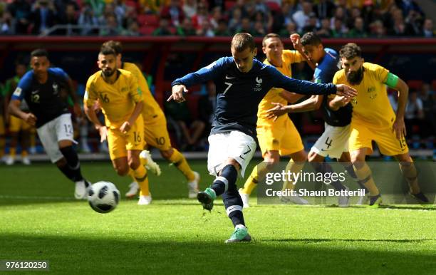 Antoine Griezmann of France scores his team's first goal from the penalty spot during the 2018 FIFA World Cup Russia group C match between France and...