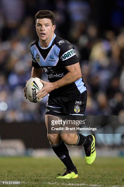 Chad Townsend of the Sharks runs the ball during the round 15 NRL match between the Cronulla Sharks and the Brisbane Broncos at Southern Cross Group...