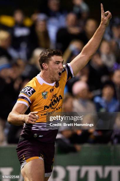 Corey Oates of the Broncos celebrates scoring a try during the round 15 NRL match between the Cronulla Sharks and the Brisbane Broncos at Southern...