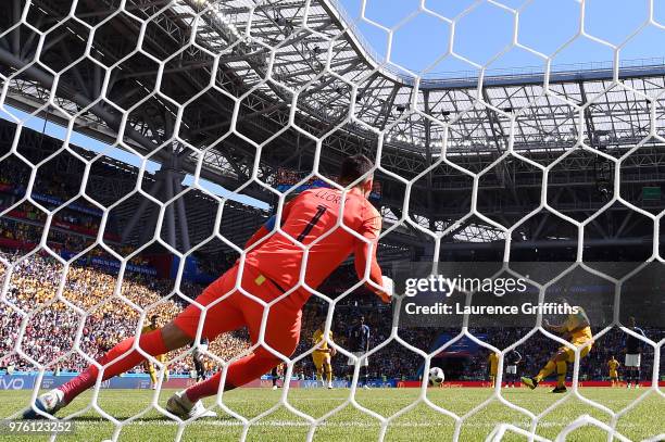 Mile Jedinak of Australia takes a penalty and scores his side's first goal past Hugo Lloris of France during the 2018 FIFA World Cup Russia group C...