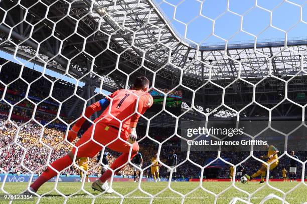 Mile Jedinak of Australia takes a penalty and scores his side's first goal past Hugo Lloris of France during the 2018 FIFA World Cup Russia group C...