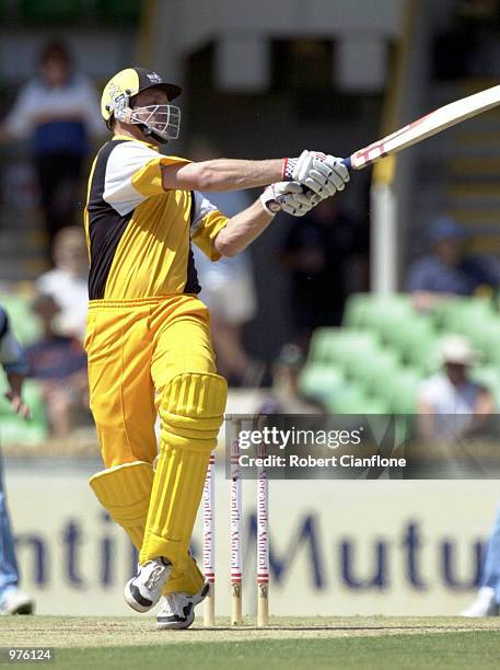 Tom Moody of the Western Warriors, smashes a ball to the boundry during the Mercantile Mutual Cup One Day final, between the Western Warriors and the...