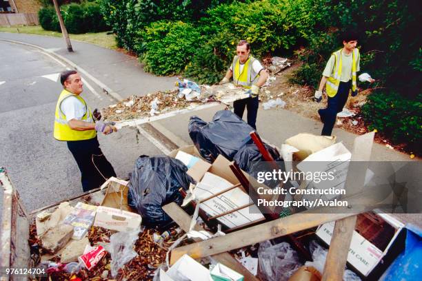 Dustmen working for the local council refuse collection service, Greenwich, London, UK.