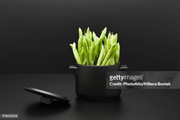 food concept, fresh green beans in miniature pot - baggy green stock pictures, royalty-free photos & images