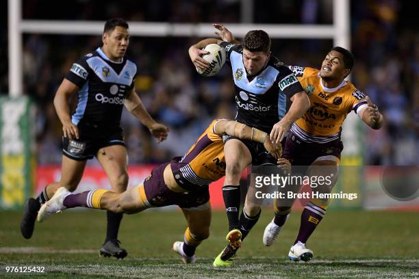 Chad Townsend of the Sharks makes a break during the round 15 NRL match between the Cronulla Sharks and the Brisbane Broncos at Southern Cross Group...