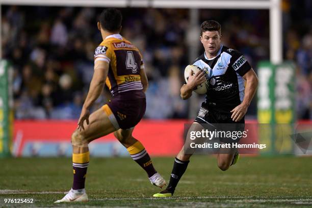 Chad Townsend of the Sharks runs the ball during the round 15 NRL match between the Cronulla Sharks and the Brisbane Broncos at Southern Cross Group...