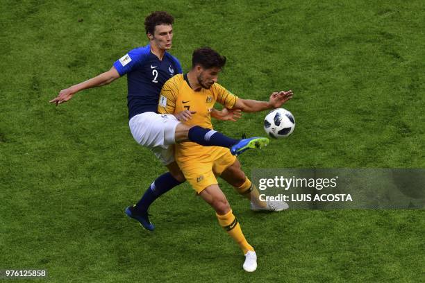 France's defender Benjamin Pavard marks Australia's forward Mathew Leckie during the Russia 2018 World Cup Group C football match between France and...