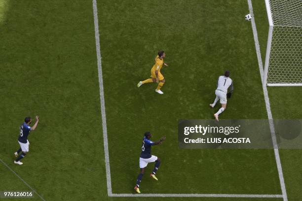 France's midfielder Nabil Fekir and France's midfielder Paul Pogba celebrate after scoring past Australia's goalkeeper Mathew Ryan during the Russia...