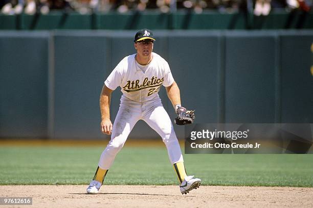 Mark McGwire of the Oakland Athletics plays first base during a game in the 1988 season at Oakland-Alameda County Coliseum in Oakland, California.