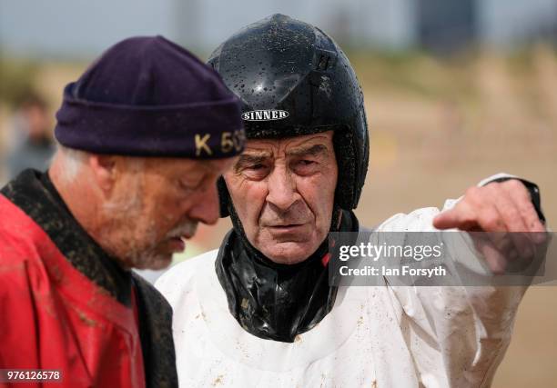 Competitors discuss tactics as they prepare to race in the National Land Sailing regatta held on Coatham Sands on June 16, 2018 in Redcar, England....