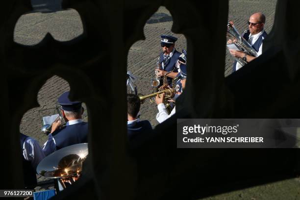Brass band plays on the main square in Aachen, western Germany, on June 15, 2018.