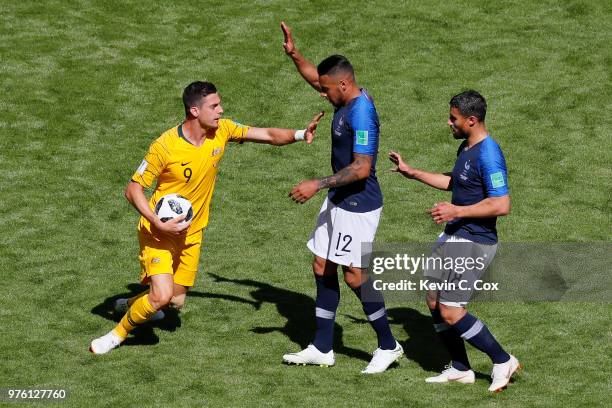 Tomi Juric of Australia reacts to Corentin Tolisso of France as Nabil Fekir of France looks on during the 2018 FIFA World Cup Russia group C match...