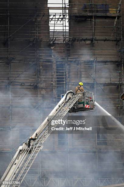 Fire fighters battle a blaze at the Glasgow School of Art for the second time in four years on June 16, Glasgow Scotland. In May 2014 it was...