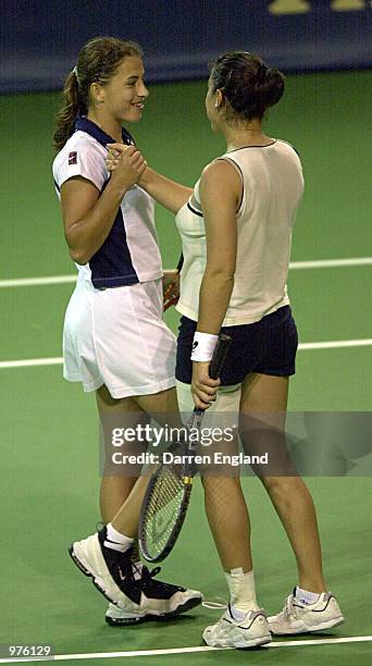 Janette Husarova of the Slovak Republic and Giulia Casoni of Italy celebrate winning the doubles semi-finals match 6-4,6-4 against Patty Schnyder of...