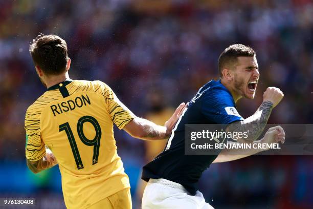 Australia's defender Joshua Risdon vies with France's defender Lucas Hernandez during the Russia 2018 World Cup Group C football match between France...