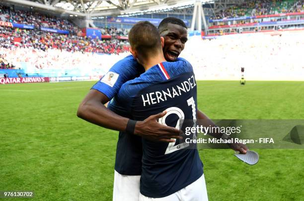 Paul Pogba celebrates with team mate Lucas Hernandez of France following the 2018 FIFA World Cup Russia group C match between France and Australia at...