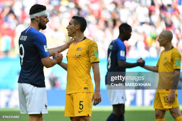 France's forward Olivier Giroud is congratulated by Australia's defender Mark Milligan at the end of the Russia 2018 World Cup Group C football match...