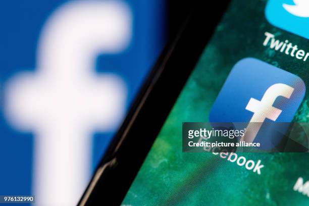 June 2018, Germany, Berlin: The Facebook app is visible on the screen of a smartphone. Photo: Fabian Sommer/dpa