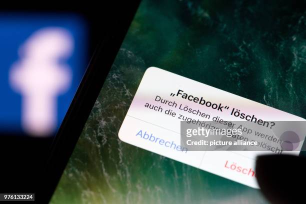 June 2018, Germany, Berlin: The question 'Delete Facebook?' appears on the screen of a smartphone in German. Photo: Fabian Sommer/dpa