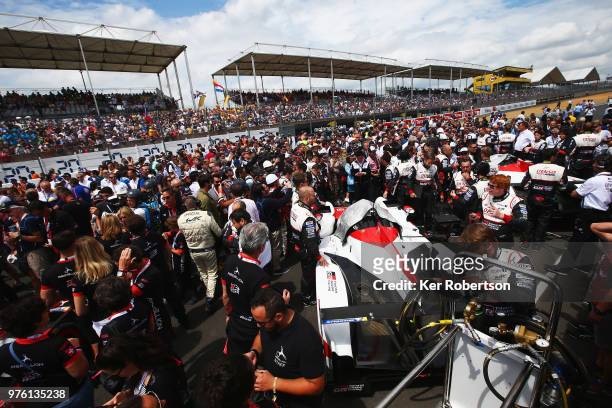 Large crowds surround the Toyota Gazoo Racing TS050 Hybrid of Mike Conway, Kamui Kobayashi and Jose Maria Lopez and The Toyota Gazoo Racing TS050...