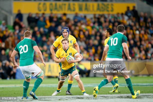 Michael Hooper of the Wallabies runs with the ball during the International test match between the Australian Wallabies and Ireland at AAMI Park on...