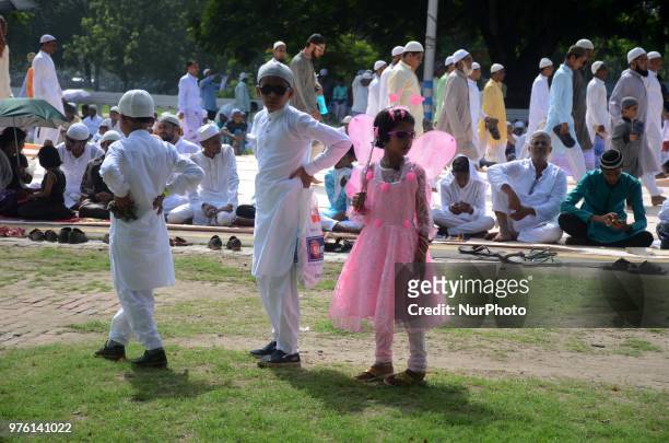 Indian Muslim children on the way to offering the Eid al Fitr prayers at Red Road in Kolkata, India on Saturday, 16th June , 2018. Muslims around the...
