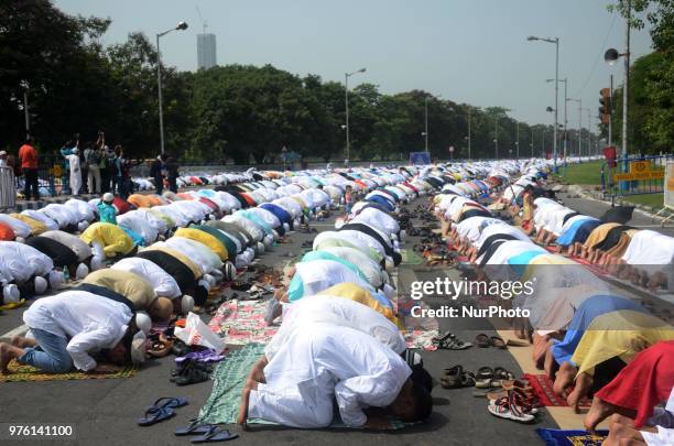 Indian Muslim devotees offering the Eid al Fitr prayers at Red Road in Kolkata, India on Saturday, 16th June , 2018. Muslims around the world are...