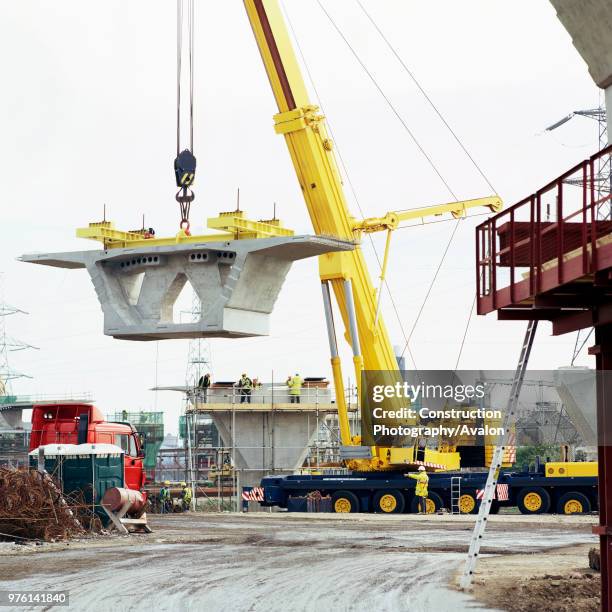 Lifting box girder section on A13 viaduct London.