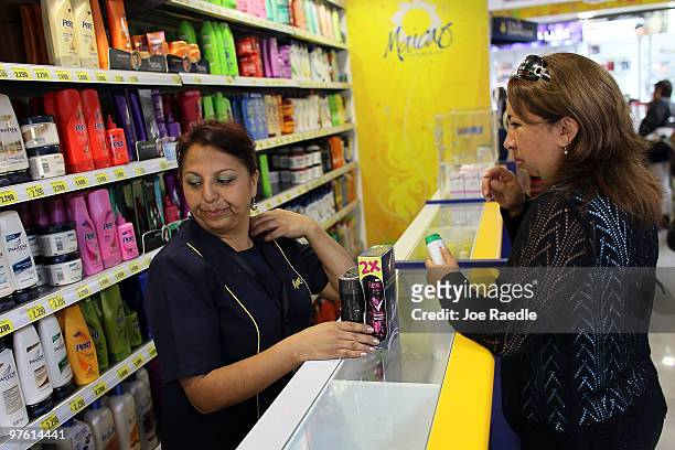 Women buys health care products as people continue to deal with the aftermath of the February 27th earthquake March 10, 2010 in Concepcion, Chile....