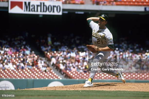 Mike Moore of the Oakland Athletics pitches during a game in the 1991 season against the California Angels at Anaheim Stadium in Anaheim, California.