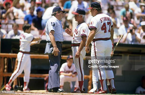 Manager Gene Mauch of the California Angels speaks with the umpire during an August 1986 game at Anaheim Stadium in Anaheim, California.