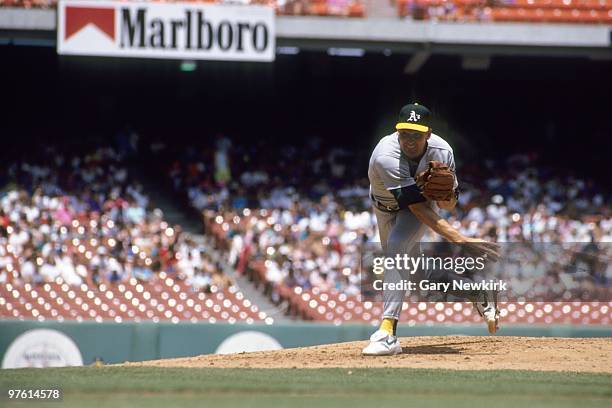 Mike Moore of the Oakland Athletics pitches during a game in the 1991 season against the California Angels at Anaheim Stadium in Anaheim, California.