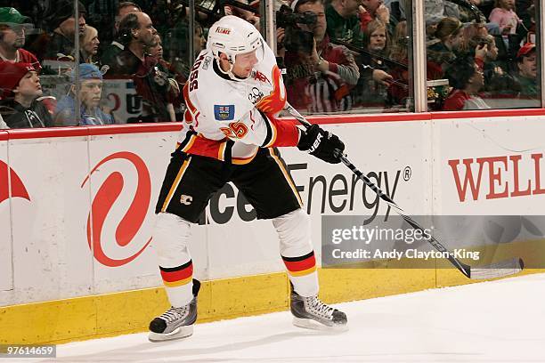 David Moss of the Calgary Flames delivers a pass against the Minnesota Wild during the game at the Xcel Energy Center on March 7, 2010 in Saint Paul,...