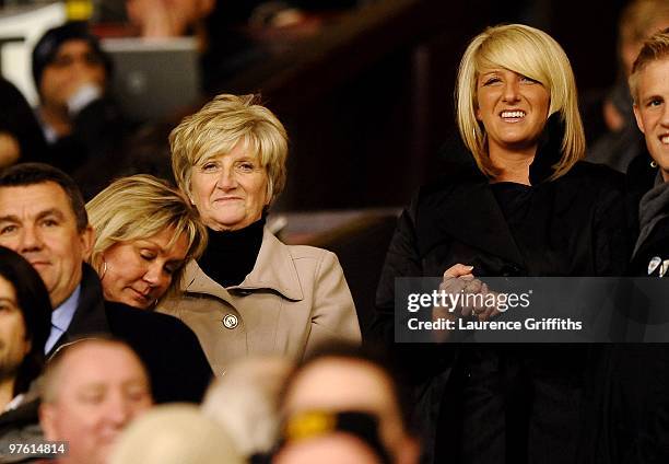 David Beckham's mother Sandra Beckham and sister Joanne Beckham look on from the stands during the UEFA Champions League First Knockout Round, second...