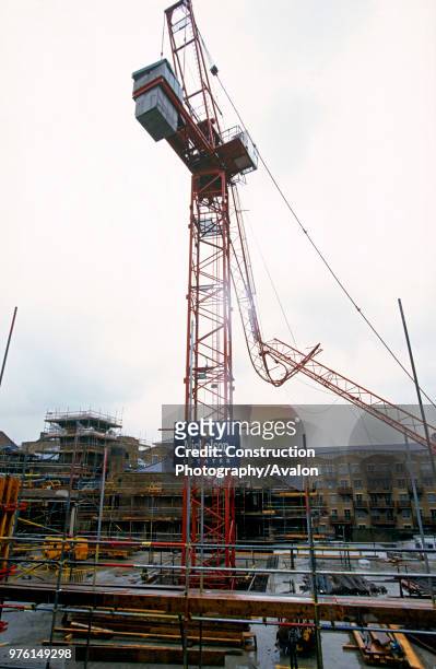 Tower Crane accident in South London, The crumpled jib hangs precariously over the building site.