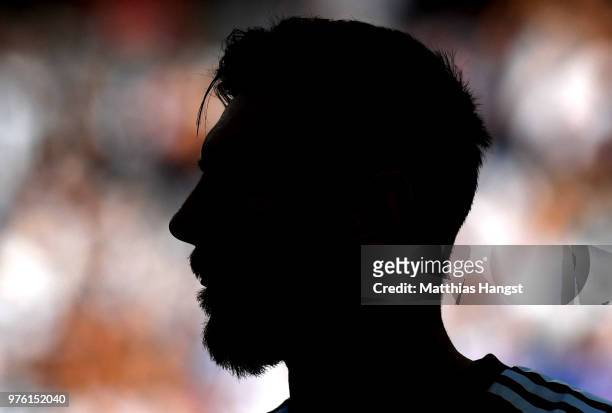 The silhouette of Lionel Messi of Argentina is seen during the 2018 FIFA World Cup Russia group D match between Argentina and Iceland at Spartak...