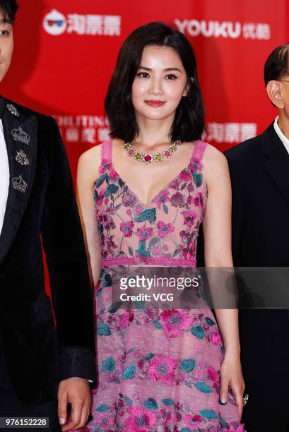 Actress and singer Charlene Choi arrives at the opening ceremony of the 21st Shanghai International Film Festival at Shanghai Grand Theatre on June...