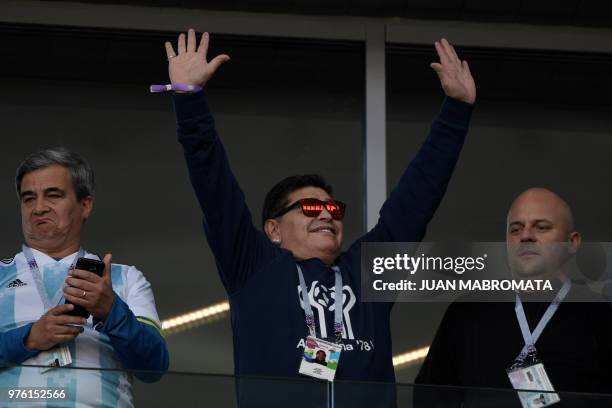 Argentina's football legend Diego Maradona waves to the crowd ahead of the Russia 2018 World Cup Group D football match between Argentina and Iceland...