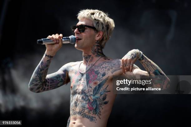 May 2018, Germany, Nuremberg: Singer of the US alternative rock band The Neighbourhood standing on stage at the open air festival 'Rock im Park'....
