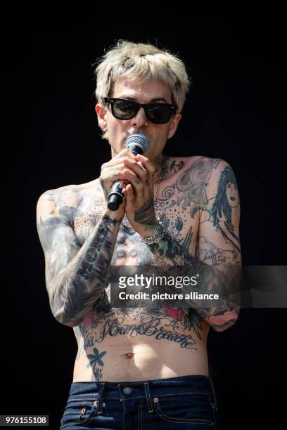 May 2018, Germany, Nuremberg: Singer of the US alternative rock band The Neighbourhood standing on stage at the open air festival 'Rock im Park'....